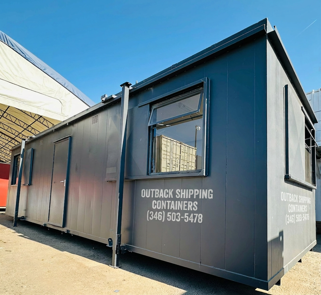 Refurbished 32x10ft anti-vandal portable cabin with gray steel exterior, secure door, and windows