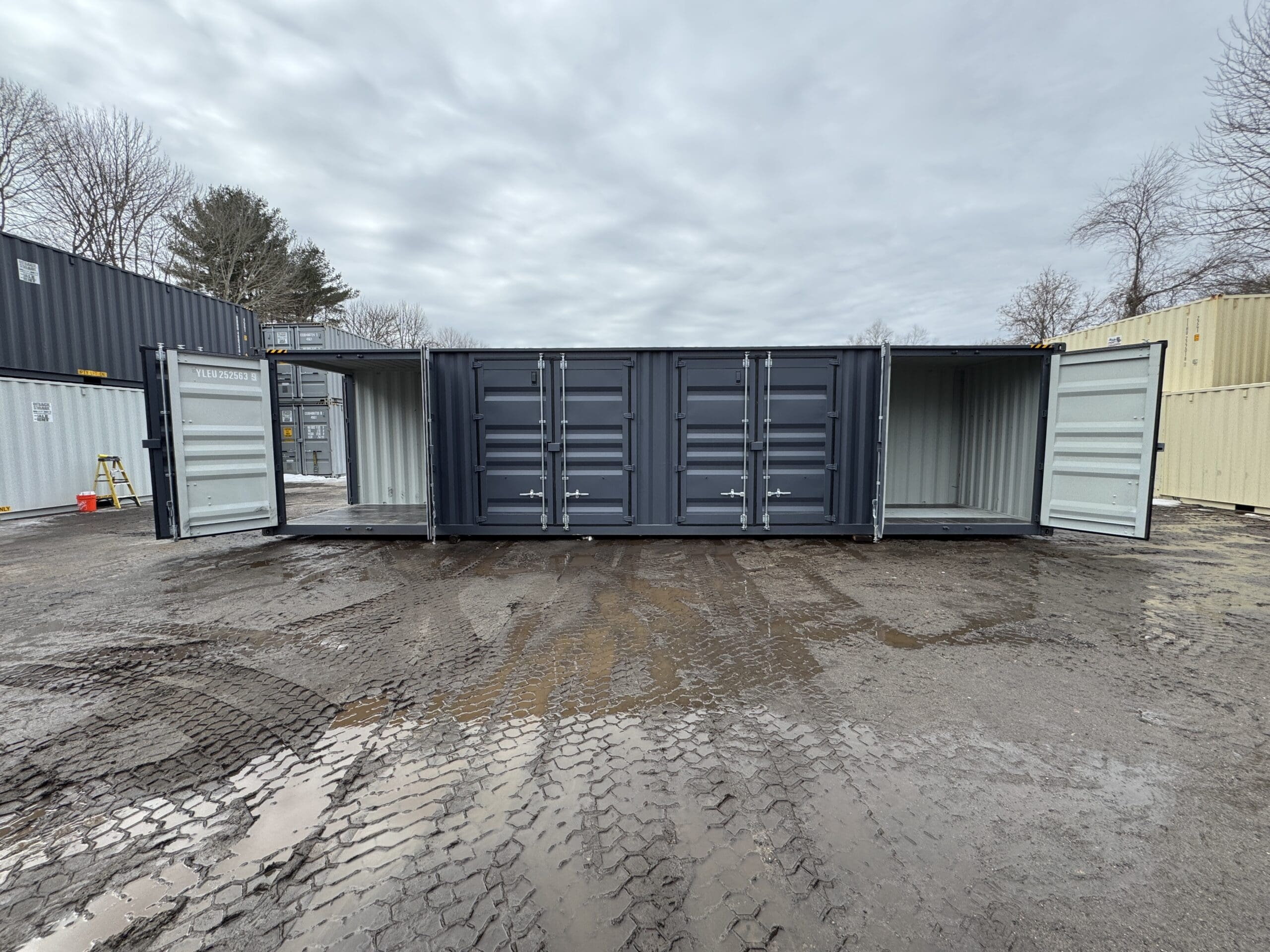 40ft New High Cube Shipping Container — Front Exterior View | Outback Shipping Containers 2 58 40ft New High Cube Shipping Container – Wind & Watertight – Dk Gray — 40ft — new (image 1 of 12)